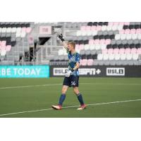 Forward Madison FC goalkeeper Chris Brady