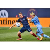 Chicago Fire FC forward Robert Beric (left) vs. New York City FC