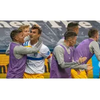 Chris Wondolowski of the San Jose Earthquakes celebrates his goal in the 97th minute to force overtime