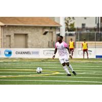 Forward Madison defender Josiah Trimmingham