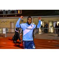 Forward Madison defender Josiah Trimmingham