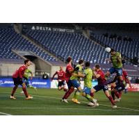 Seattle Sounders FC go high for a header against FC Dallas