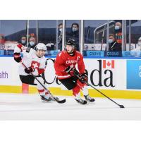 Vancouver Giants defenceman Bowen Byram skating with Canada