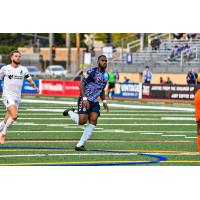 Forward Madison defender Josiah Trimmingham