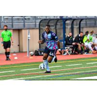 Forward Madison defender Josiah Trimmingham