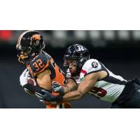 Defensive back Branden Dozier with the B.C. Lions (left)