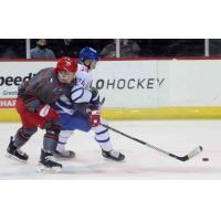 Wichita Thunder forward Bobby McMann (right) vs. the Allen Americans