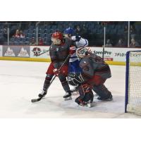 Defenseman Les Lancater and goaltender Justin Kaplemaster of the Allen Americans