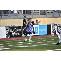 Forward Madison FC defender Christian Diaz