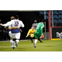 Dallas Sidekicks forward Felipe De Sousa fires a shot toward Tacoma Stars goalkeeper Mike Arguello
