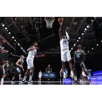 Delaware Blue Coats forward Paul Reed takes a shot against the Iowa Wolves