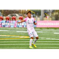 Forward Madison midfielder Michael Vang
