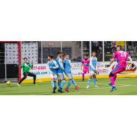 St. Louis Ambush defender Stefan Mijatovic (right) fires a shot past the San Diego Sockers