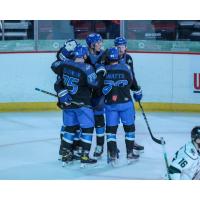 Wichita Thunder huddle after a goal