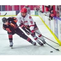 New Jersey Titans center Nick Seitz (right) vs. the Danbury Hat Tricks