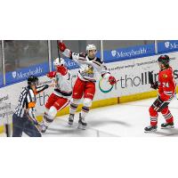 Grand Rapids Griffins forward Tyler Spezia (center) vs. the Rockford IceHogs