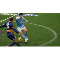 Mike Ramos of the Tacoma Stars (25) defends against San Diego Sockers forward Kraig Chiles