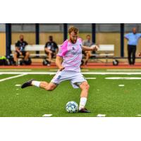 Forward Madison FC defender Connor Tobin