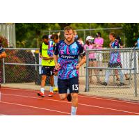 Forward Madison FC defender Connor Tobin