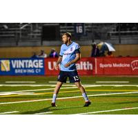 Forward Madison FC defender Connor Tobin