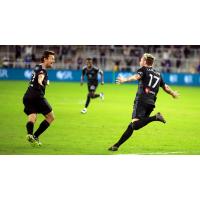 Louisville City FC forwards Antoine Hoppenot and Cameron Lancaster (right)