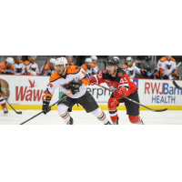 Binghamton Devils left wing Ben Thomson (right) vs. the Lehigh Valley Phantoms