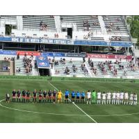 North Carolina Courage and the Washington Spirit line up before their Challenge Cup game