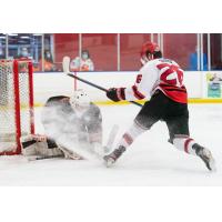 New Jersey Titans forward Jake Suede shoots against the Danbury Jr. Hat Tricks