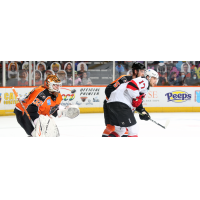 Binghamton Devils left wing A.J. Greer (right) vs. the Lehigh Valley Phantoms