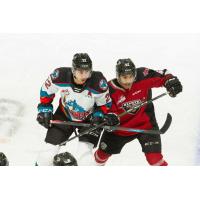 Vancouver Giants centre Justin Sourdif (right) vs. the Kelowna Rockets