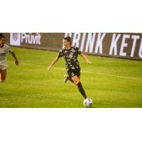 Racing Louisville FC forward Cece Kizer in the rain
