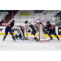 Vancouver Giants goaltender Trent Miner lunges for a loose puck vs. the Kamloops Blazers