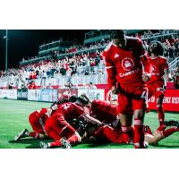 Phoenix Rising FC celebrates a goal vs. San Diego Loyal SC in the inaugural game at Wild Horse Pass