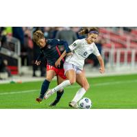 Racing Louisville FC defender Emily Fox (right) vs. the Washington Spirit