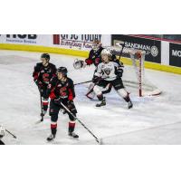 Prince George Cougars goaltender Taylor Gauthier and defenders vs. the Vancouver Giants