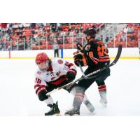 New Jersey Titans forward Matthew Iasenza (left) vs. the Danbury Jr. Hat Tricks