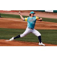 Charleston RiverDogs pitcher Cole Wilcox in Los Perros Santos de Charleston jersey