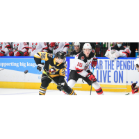 Binghamton Devils forward Tyce Thompson (right) vs. the Wilkes-Barre/Scranton Penguins
