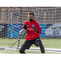 Forward Madison FC goalkeeper Aidan Hogan