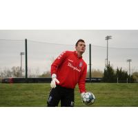 Forward Madison FC goalkeeper Aidan Hogan