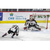 Vancouver Giants goaltender Trent Miner and defenceman Tanner Brown vs. the Kamloops Blazers