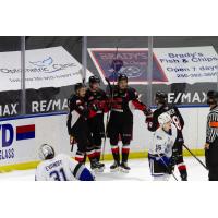 Prince George Cougars celebrate a goal vs. the Victoria Royals