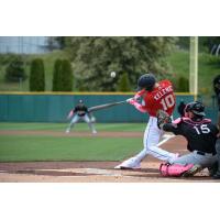 Tacoma Rainiers center fielder Jarred Kelenic connects on a pitch