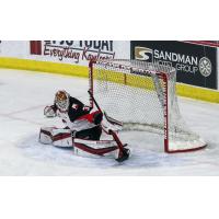 Prince George Cougars goaltender Taylor Gauthier makes a save vs. the Kelowna Rockets