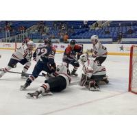 Odessa Jackalopes and Amarillo Bulls scramble in front of the Odessa net