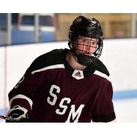 William Whitelaw with the Shattuck St. Mary Prep Team