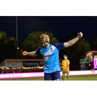 Forward Madison FC defender Connor Tobin