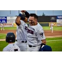 Donny Sands of the Somerset Patriots celebrates at home