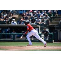 Shed Long of the Tacoma Rainiers breaks from the box
