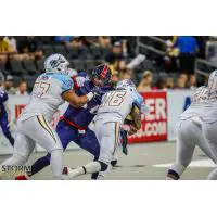 Sioux Falls Storm prepares to make a tackle against the Frisco Fighters